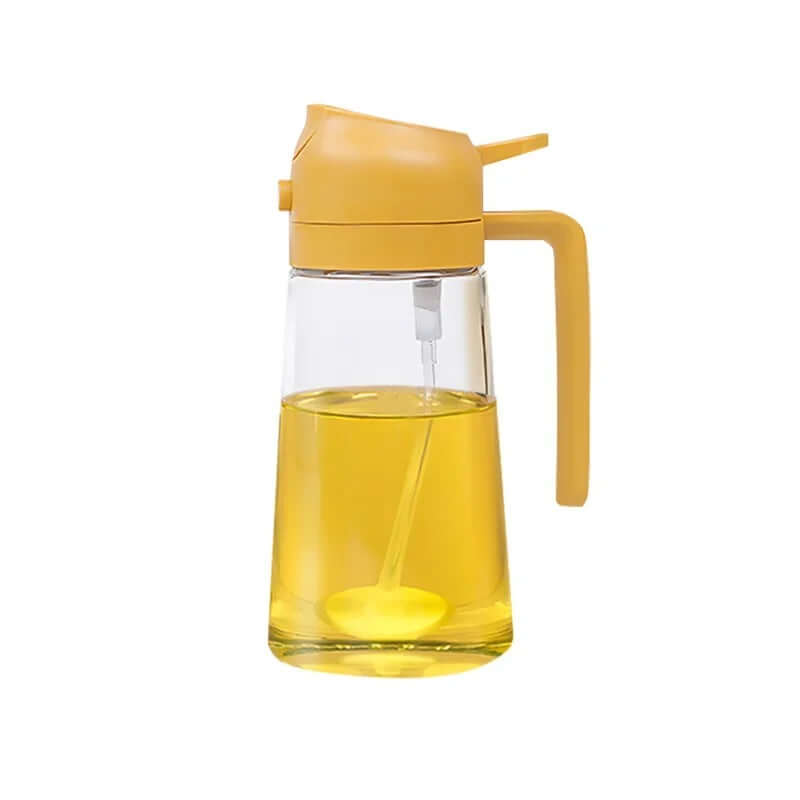 2-in-1 glass oil dispenser and sprayer with yellow lid, ideal for controlled pouring and misting of oil.