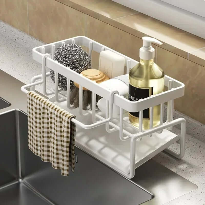 Adjustable sink storage and drainage rack holding sponges, soap, and a dishcloth, designed for easy installation and organization.