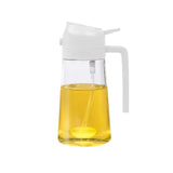 2-in-1 glass oil dispenser and sprayer with a modern design and yellow oil inside.